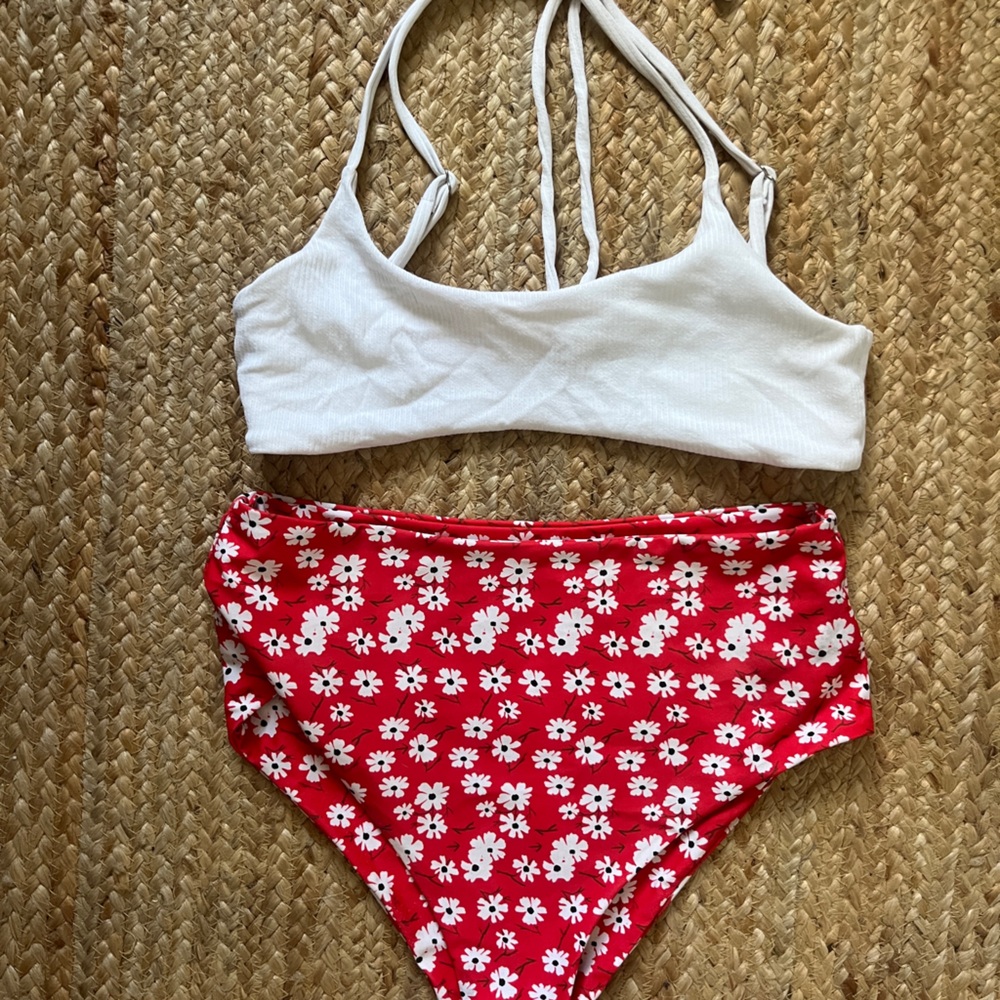 Stylish White Bikini Top with Red Floral Bottoms